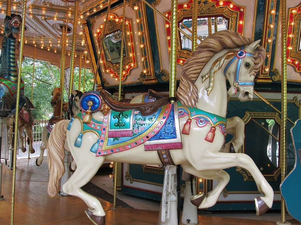 Carousel horse at the Franklin Square carousel minutes from our apartments near Franklin Square.