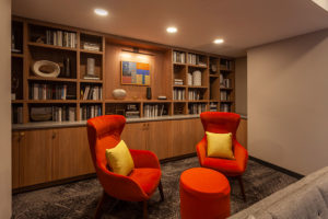Resident library with work stations at Chocolate Works apartments in Old City
